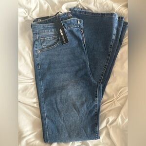 Fashion Nova Women's Mid-Blue flare Love Affair Jeans